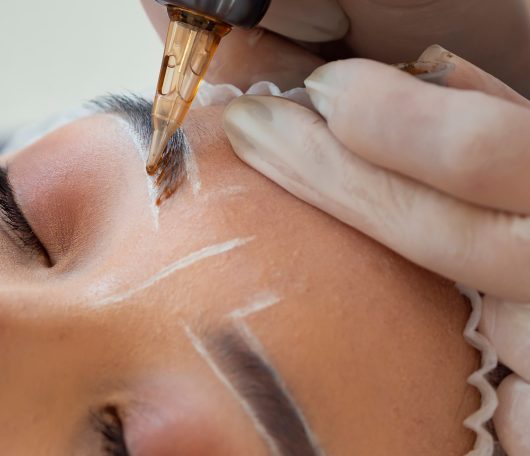 young-woman-going-through-microblading-procedure-2