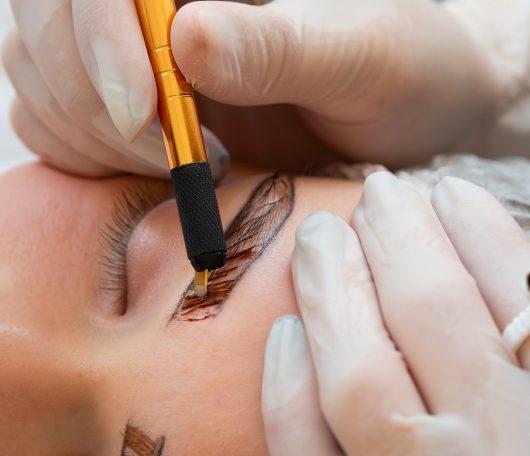 young-woman-going-through-microblading-procedure